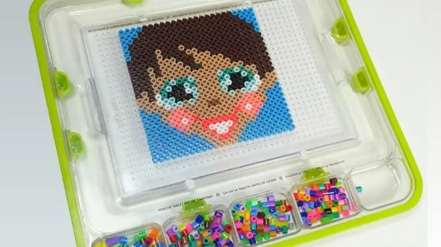 Manualidades para niños - Cara de niña en perlas para planchar Manualidades para niños - Cara de niña en perlas para planchar