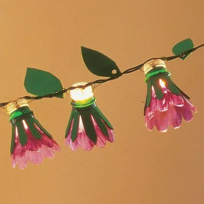 Manualidades de primavera recicladas: una guirnalda de flores Manualidades de primavera recicladas: una guirnalda de flores