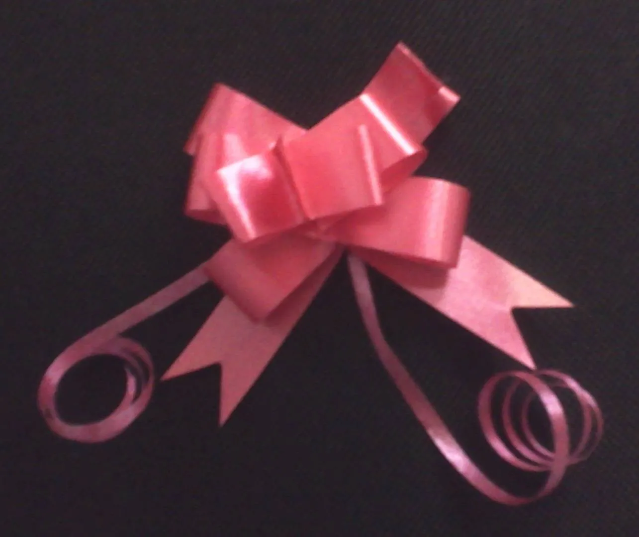 Cómo hacer un moño con cinta de regalo - Innatia.com Cómo hacer un moño con cinta de regalo - Innatia.com