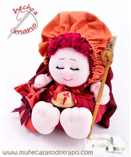 Muñeca de trapo negra en tela rosa hecha con saco de aromáticas. Muñeca de trapo negra en tela rosa hecha con saco de aromáticas.