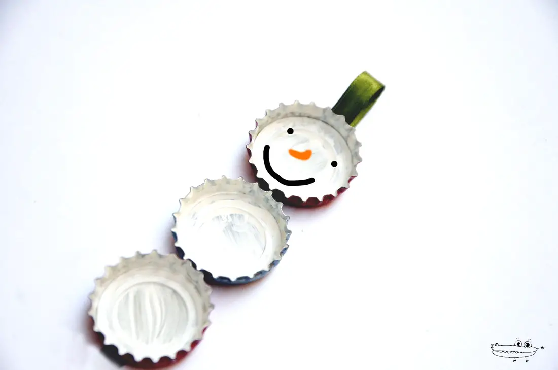 Muñeco nieve chapas -Manualidades Infantiles Muñeco nieve chapas -Manualidades Infantiles