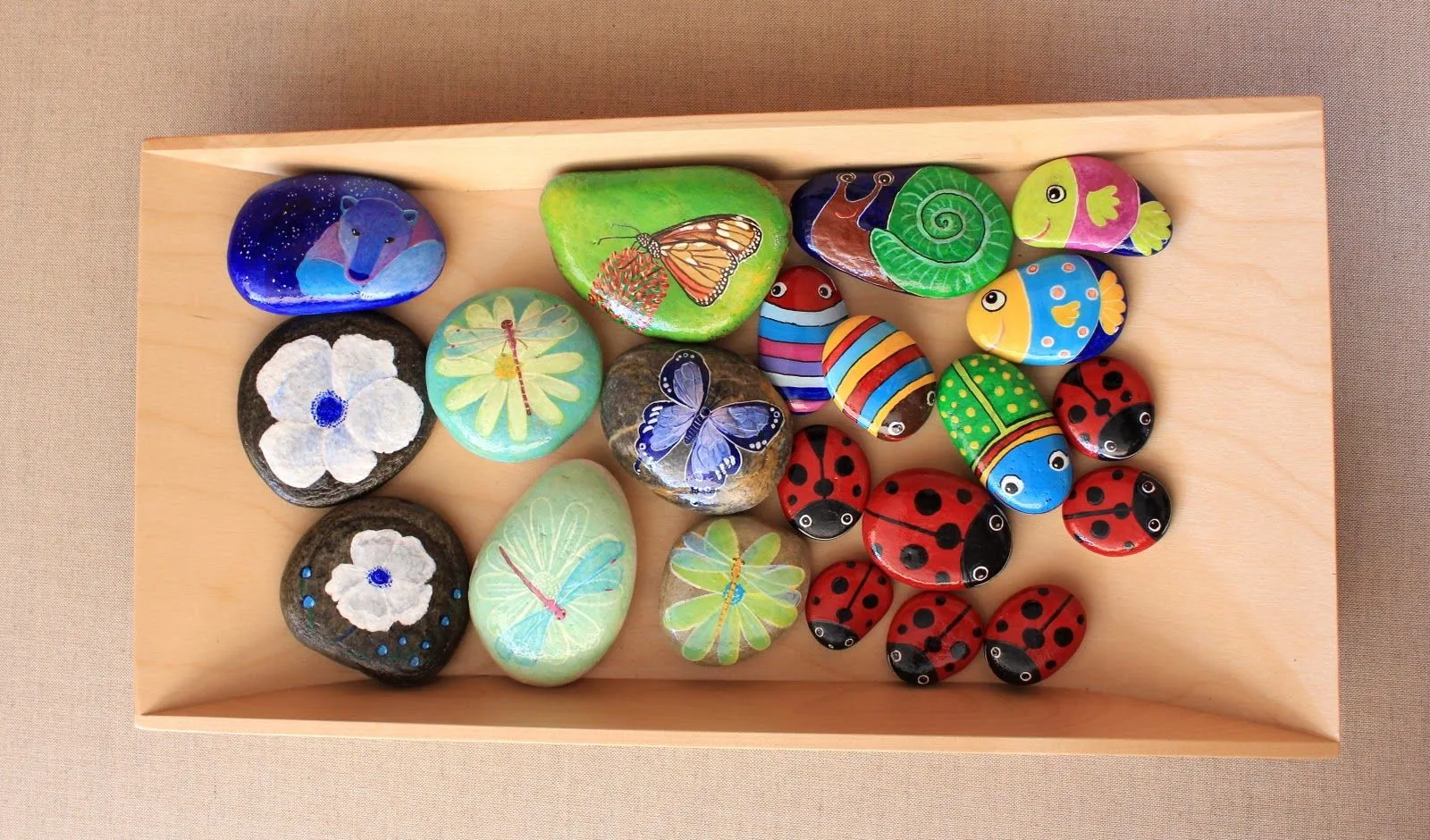Nueve Pinceladas: Pintando Piedras II