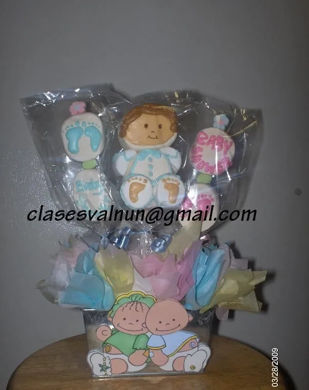 Con paletas de bombon para baby shower | Centro de mesa ...