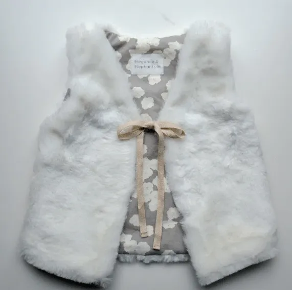 Pequeña Fashionista: Tutorial: Chaleco de pelo reversible