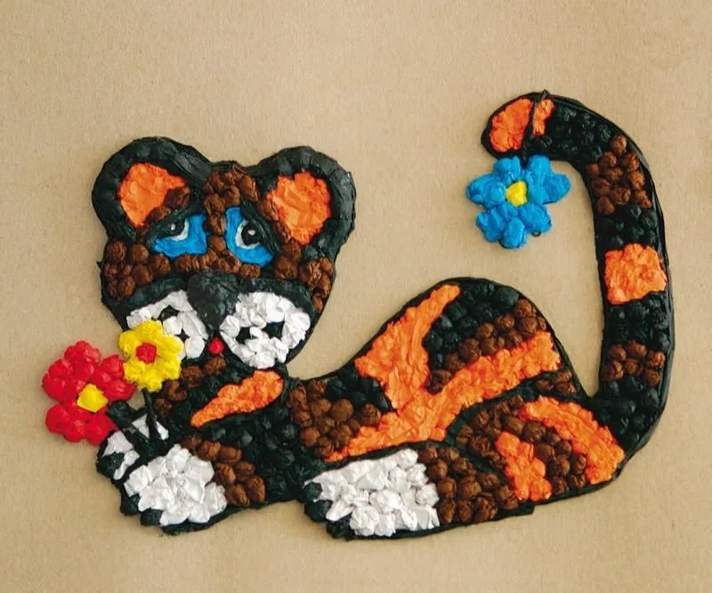 Realizar un pequeño tigre con bolas de papel de seda de colores | Canson® Realizar un pequeño tigre con bolas de papel de seda de colores | Canson®