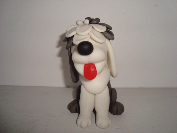 Perros y gatos en porcelana fria - Imagui