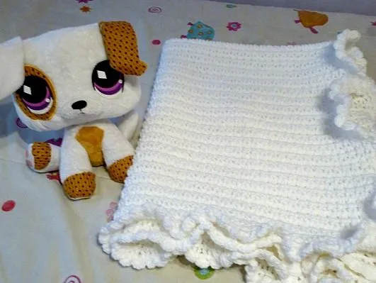 Un pollo que toca el piano: Manta de crochet para bebé Un pollo que toca el piano: Manta de crochet para bebé