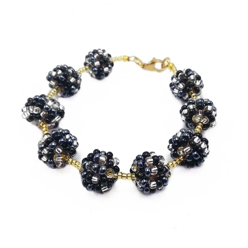 Pulsera con bolas tejidas en chaquira - Juliana Martinez Accesorios Pulsera con bolas tejidas en chaquira - Juliana Martinez Accesorios