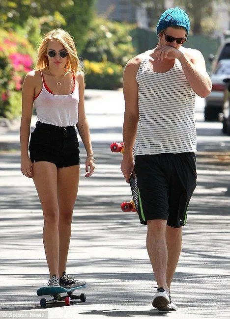 Skater girl Miley Cyrus shows off new blonde locks as she cruises ... Skater girl Miley Cyrus shows off new blonde locks as she cruises ...