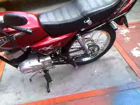 suzuki ax 100-2 2010 2t una maquinita - YouTube