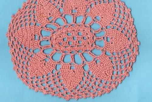 Imagen Tapete a crochet color rosa - grupos. Imagen Tapete a crochet color rosa - grupos.