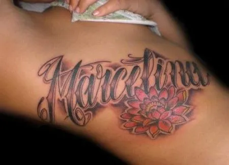 TATUAJE DEL NOMBRE MARCELINA Y UNA FLOR