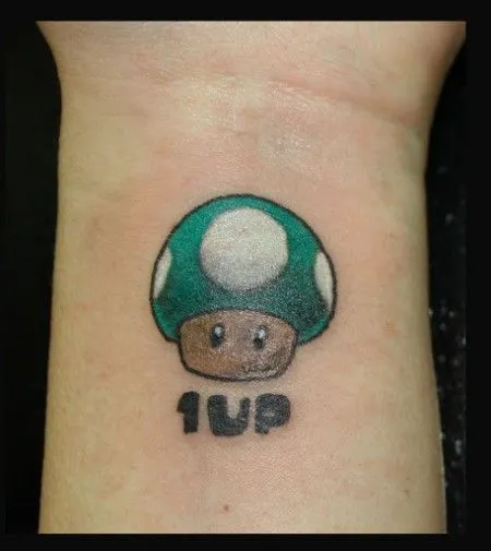 TATUAJE DEL CHAMPIÑÓN DE LAS VIDA DE MARIO BROS TATUAJE DEL CHAMPIÑÓN DE LAS VIDA DE MARIO BROS
