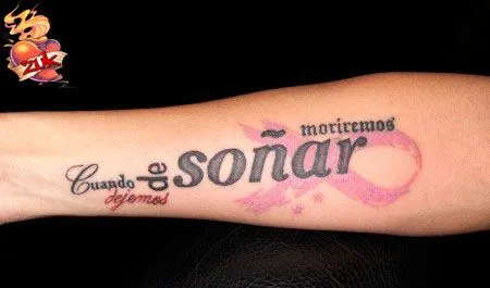 TATUAJE DE UNA FRASE EN EL ANTEBRAZO CON UN LAZO DE SOLIRADIDAD TATUAJE DE UNA FRASE EN EL ANTEBRAZO CON UN LAZO DE SOLIRADIDAD