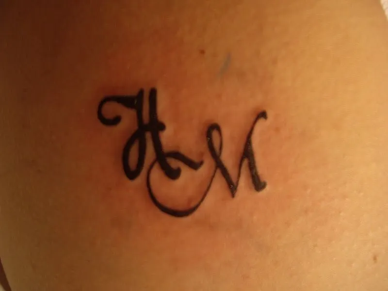Tatuajes de la letra m - Imagui