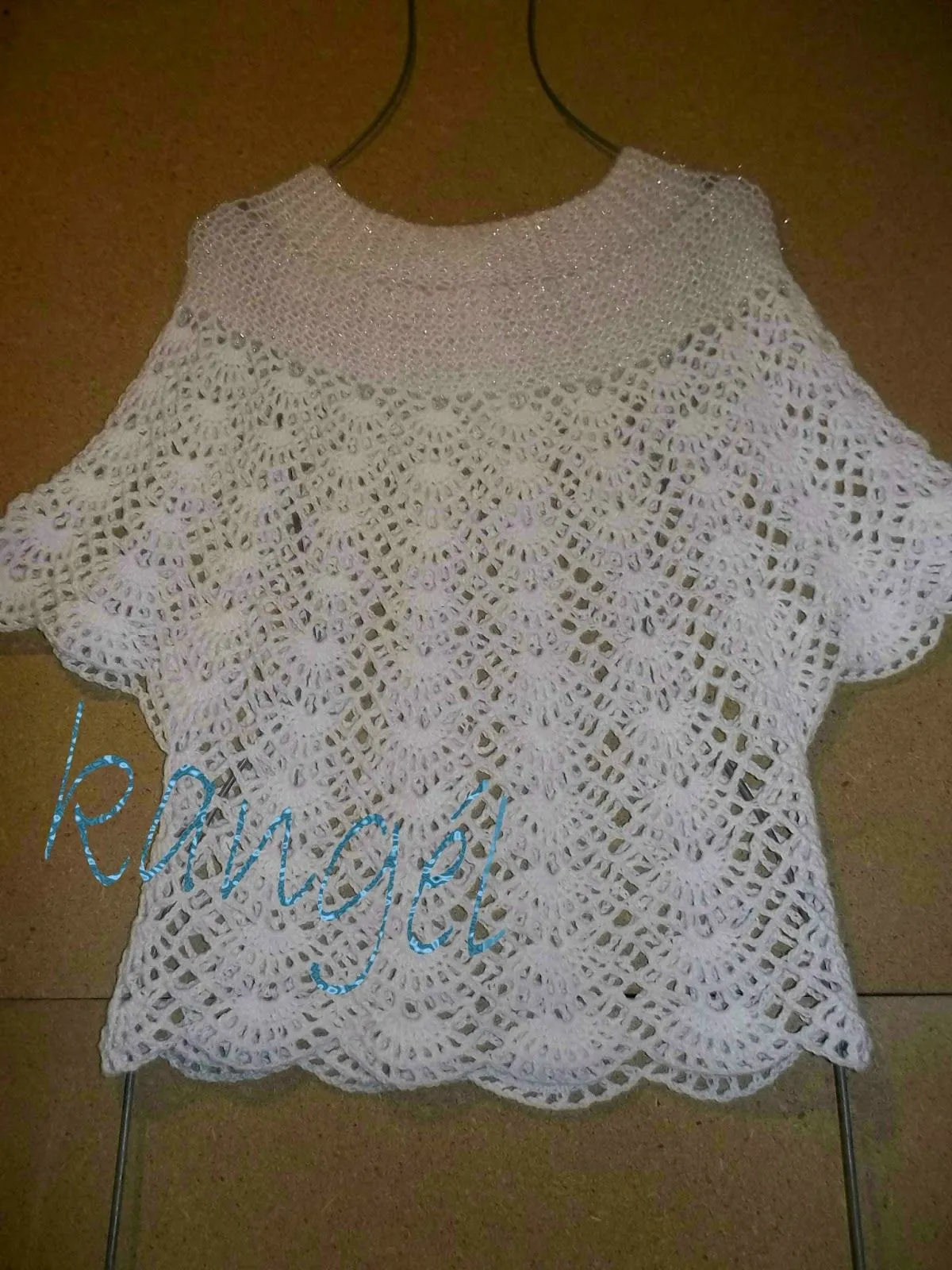 Tejidos Kangél: blusa blanca con arcos