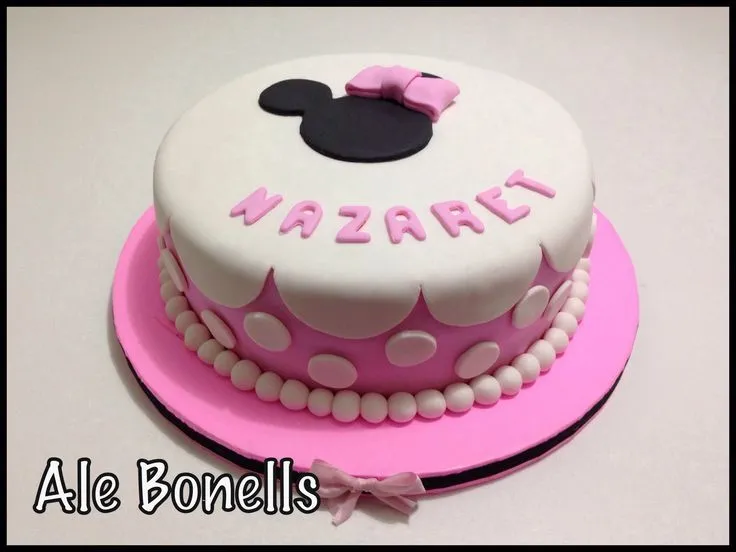 Minnie cake. Torta de Minnie rosa. Lunares, volados y moños ...