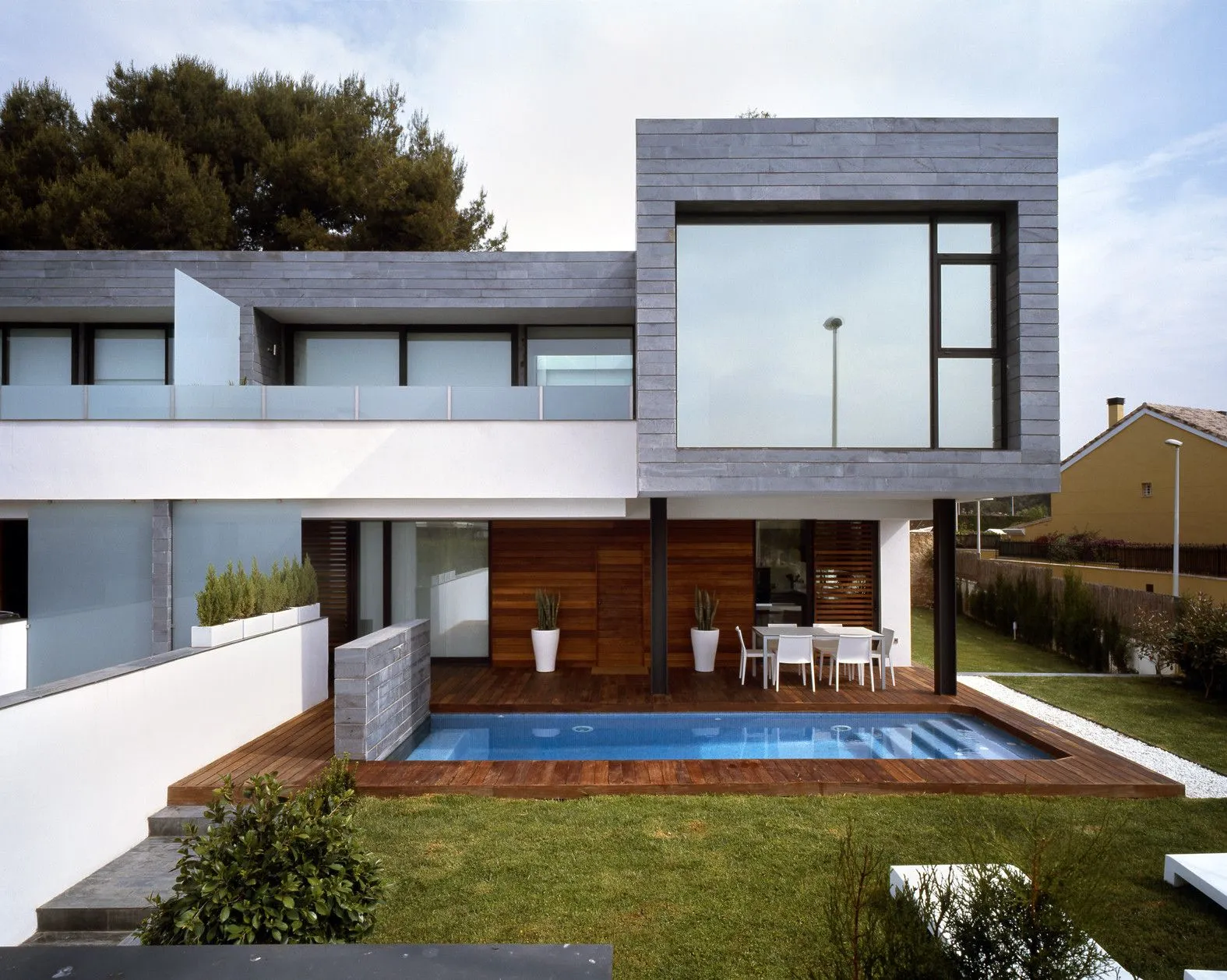 6 Viviendas Pareadas y 1 vivienda Aislada en Rocafort / Antonio Altarriba Arquitectos | ArchDaily México 6 Viviendas Pareadas y 1 vivienda Aislada en Rocafort / Antonio Altarriba Arquitectos | ArchDaily México