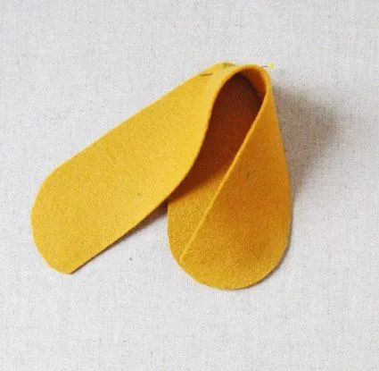 Zapatitos de fieltro para bebés - Guía de MANUALIDADES Zapatitos de fieltro para bebés - Guía de MANUALIDADES