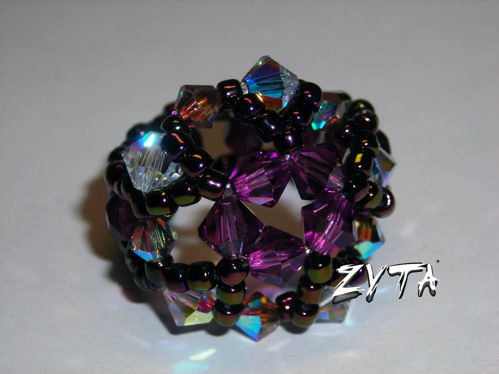 zyta duendecica: ANILLO ESTRELLA MORADO TUPIS